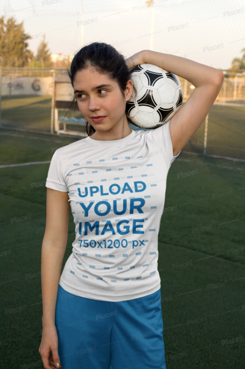Girl Holding a Soccer Ball